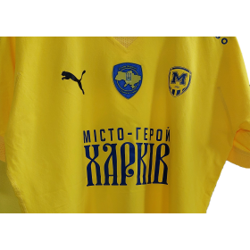 Maksym Zhichikov's game t-shirt. PUMA Yellow Hero City Kharkiv